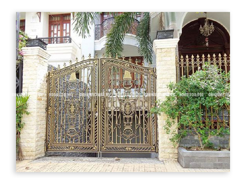 Cổng nhôm đúc phong thủy họa tiết đồng tiền